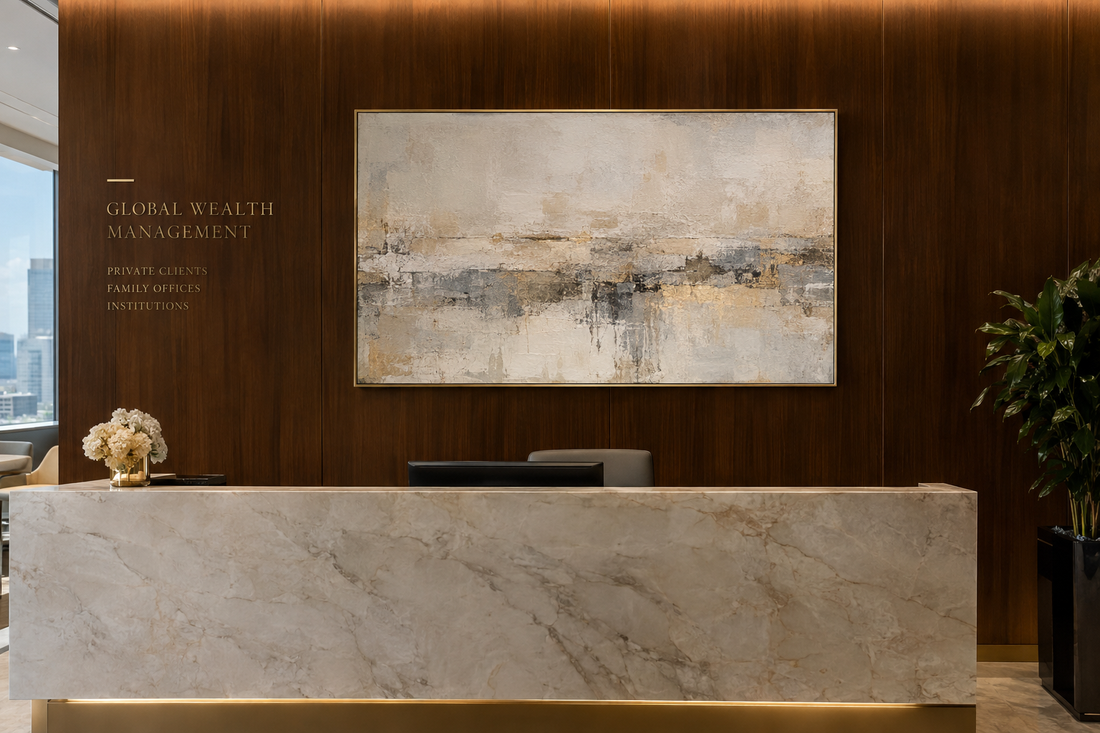Private wealth management executive reception lounge with champagne gold framed textured abstract canvas wall art